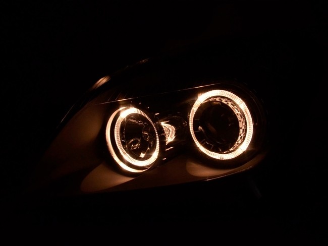 Чорні фари передні Opel Astra H з кільцями Angel Eyes