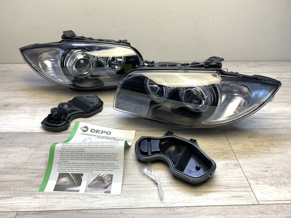 Передні фари BMW E87/ E81/ E82/ E88 чорні з кільцями