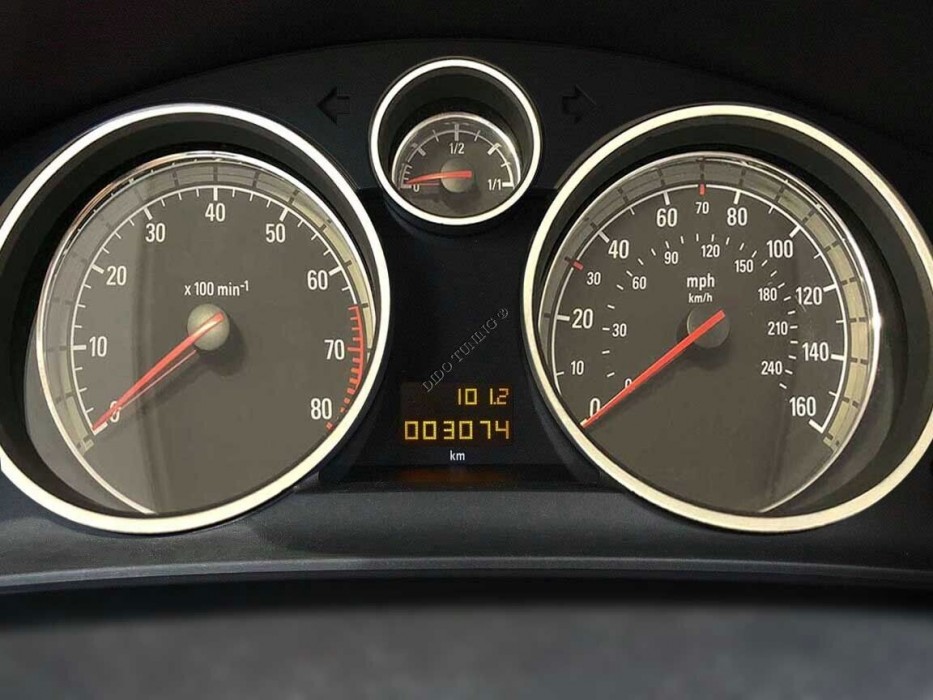 Хромовані кільця в щиток приладів Opel Astra H