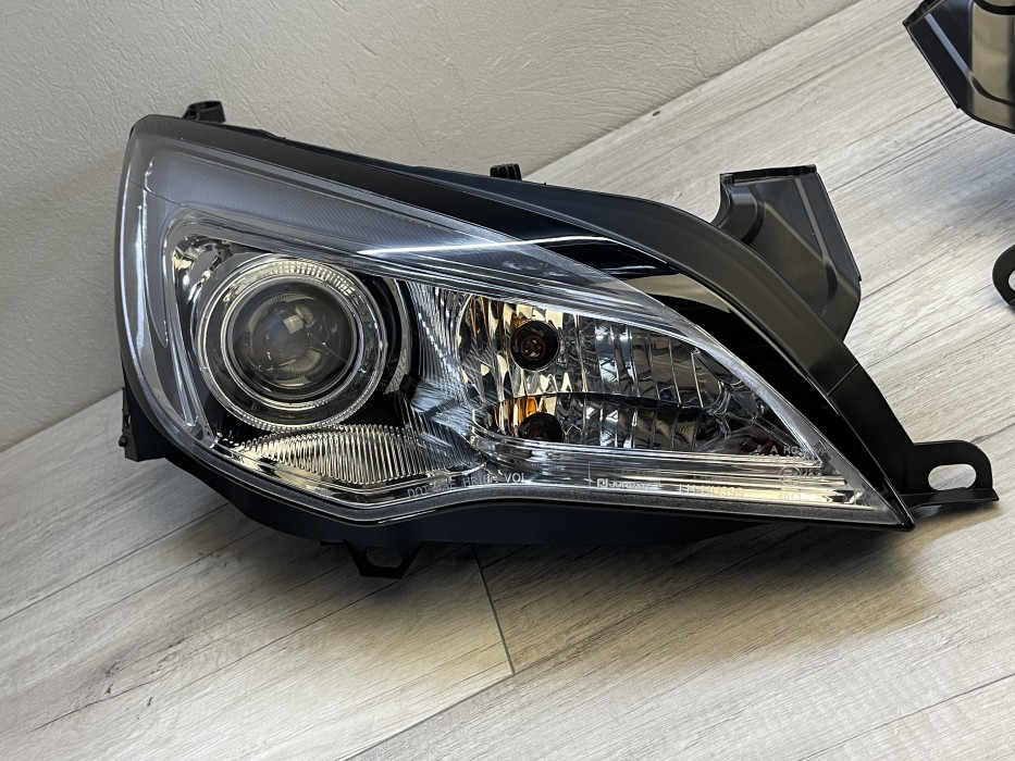 Тюнінгові передні фари Opel Astra J хромовані з DRL