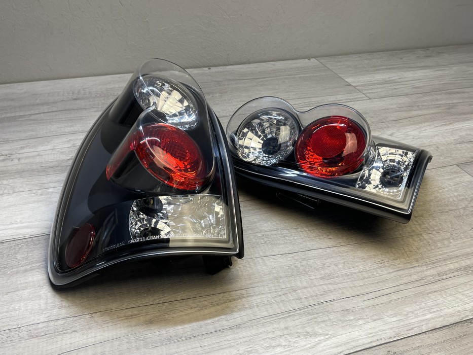 Чорні тюнінгові задні ліхтарі Chrysler Voyager, Dodge Caravan