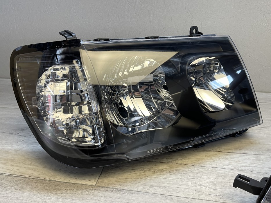 Чорні фари передні Toyota Land Cruiser FJ100 1998-2004