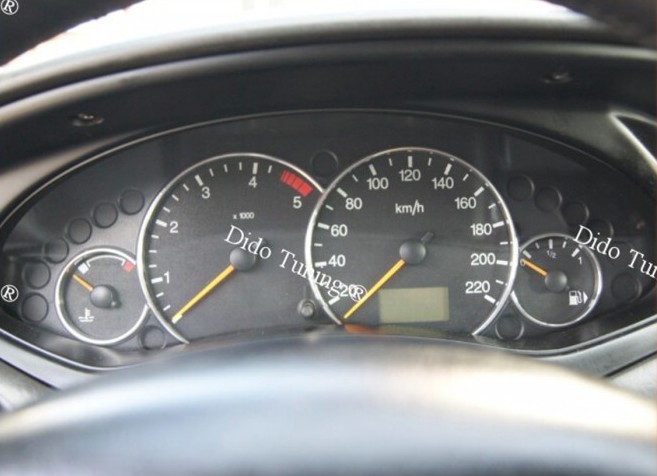 Хромовані кільця в панель приладів Ford Focus MK1