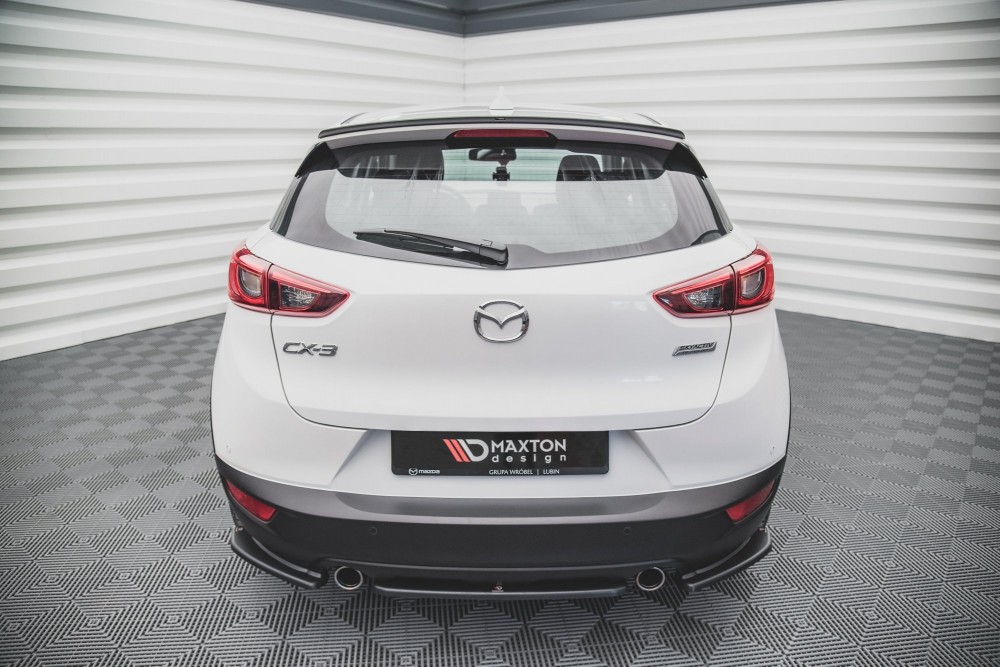Центральний дифузор (накладка) заднього бампера Mazda CX-3