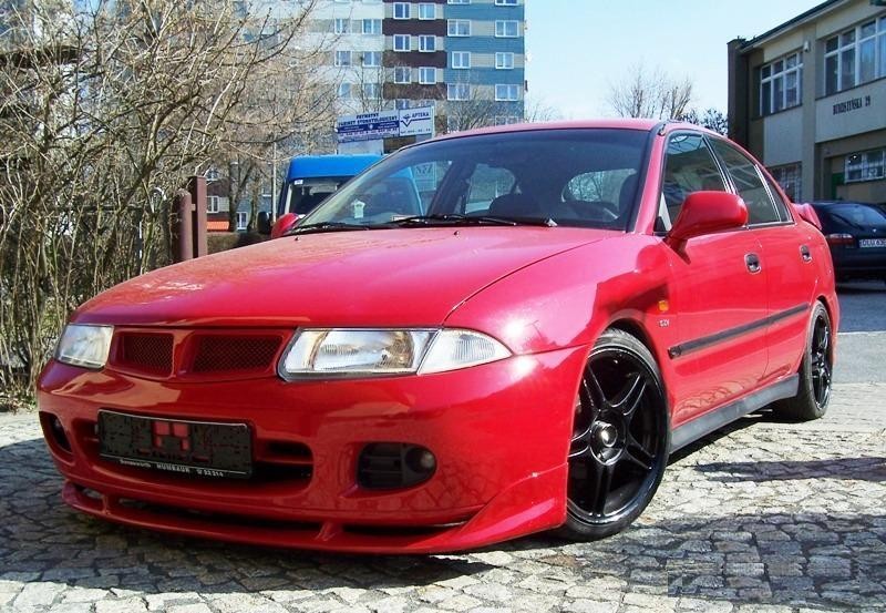 Тюнінгова накладка переднього бампера Mitsubishi Carisma 95-00