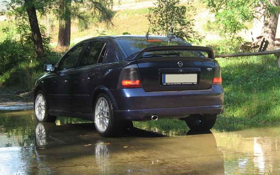 Бампер задній Opel Astra G Hatchback стиль OPC