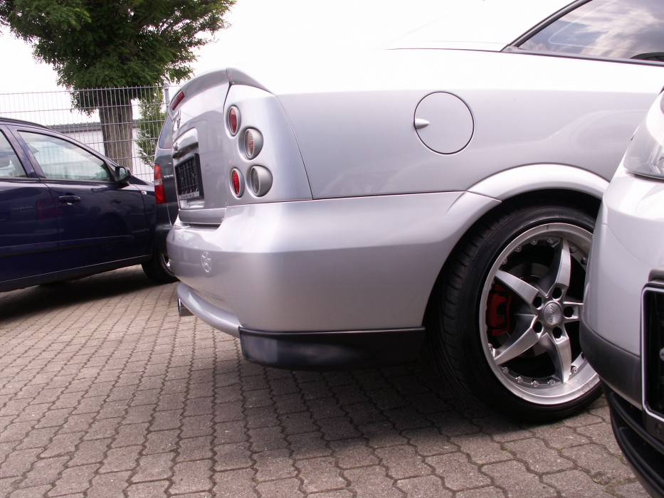 Накладки куточки заднього бампера Opel Astra G Coupe / Cabrio