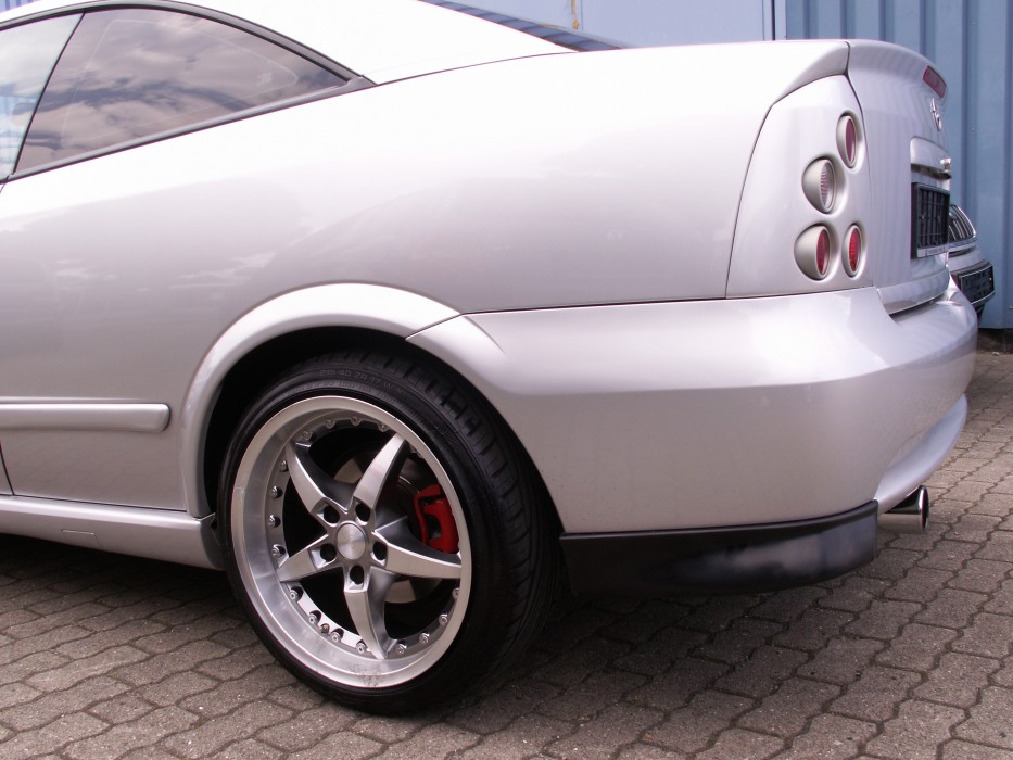 Накладки куточки заднього бампера Opel Astra G Coupe / Cabrio