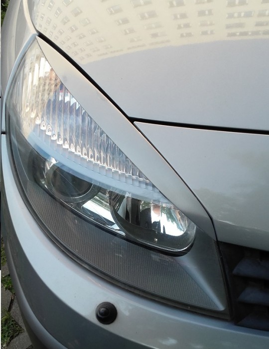 Накладки на передні фари Renault Scenic 2