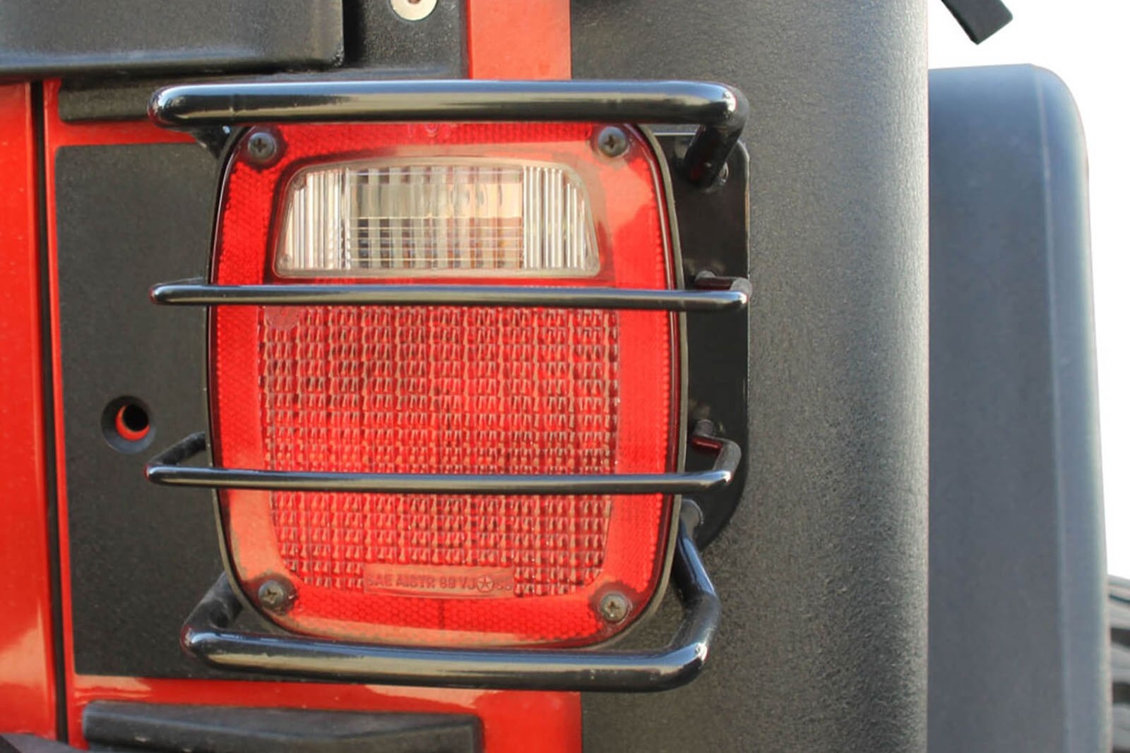 захисні накладки на задні ліхтарі Jeep Wrangler YJ/TJ