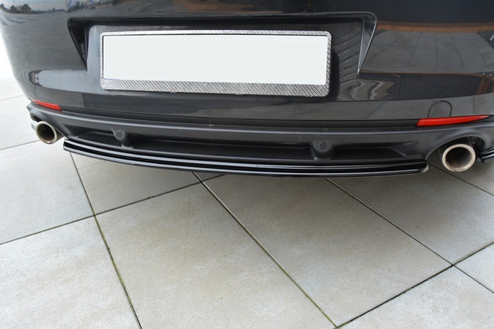 Бічні дифузори заднього бампера Renault Laguna mk 3